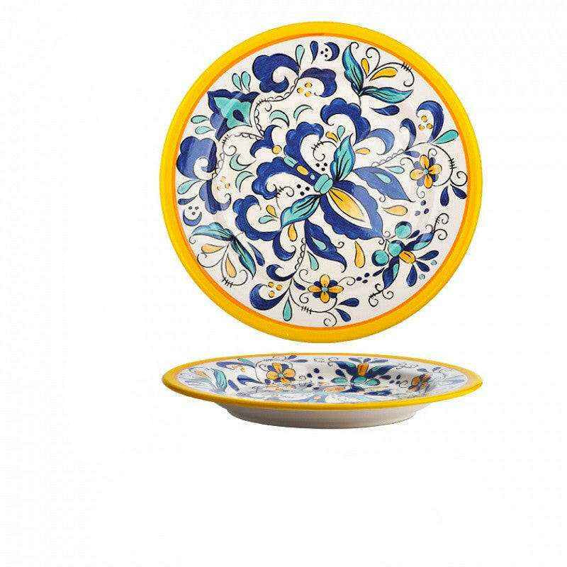 Imari Porcelain Japanese plates with vibrant floral design and yellow rim.