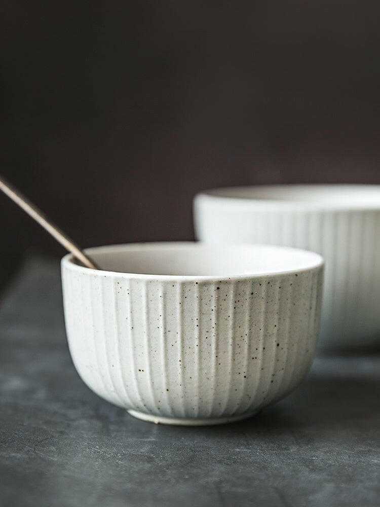 Stylized ceramic bowls, exemplifying modern design and artisanal craftsmanship.