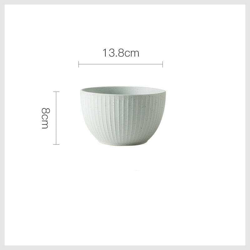 Stylized ceramic bowl with geometric texture and neutral color palette, measuring 13.8cm.