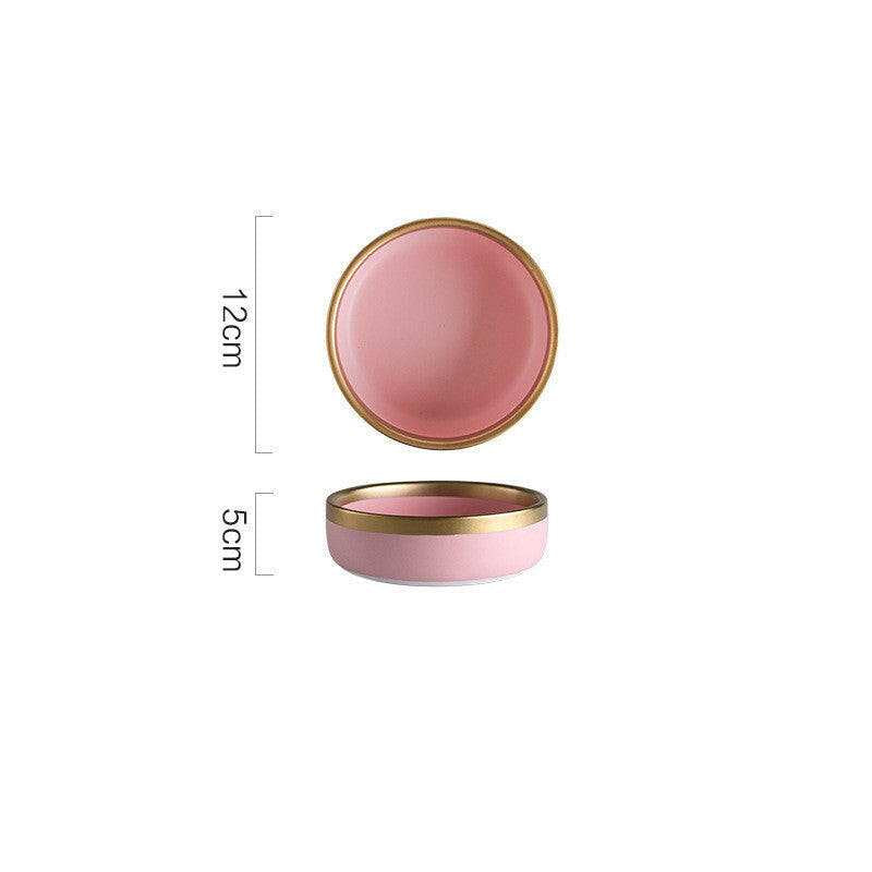 Pink Mood dining set with round pink bowls, measuring 12cm in diameter, featuring a fine finish and gold trim.