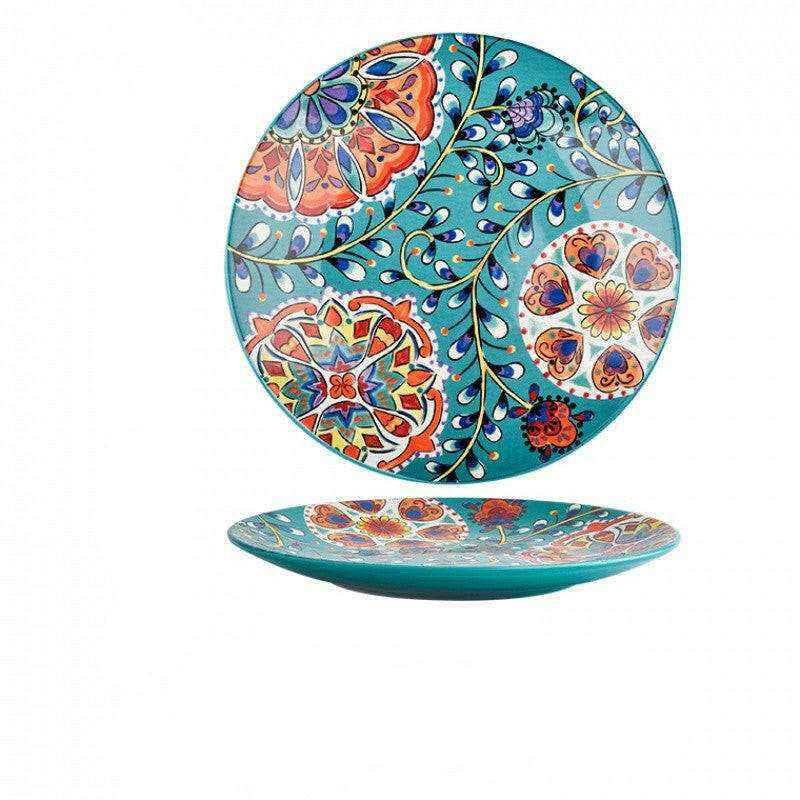 Imari Porcelain Japanese plates with intricate patterns and vibrant hues on a turquoise background.