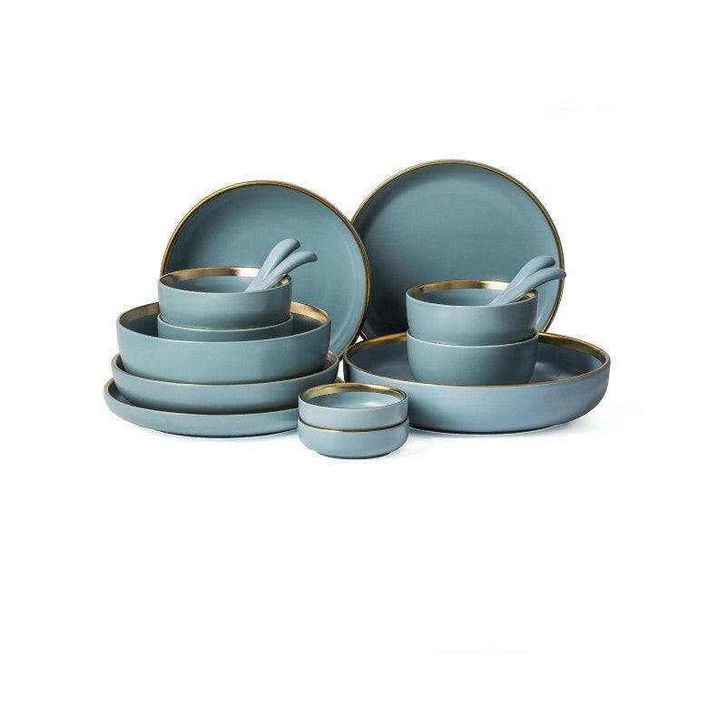 Ceramic tableware set for home dining, featuring dinner plates, bowls, and mugs in elegant blue with gold trim, durable and stylish.