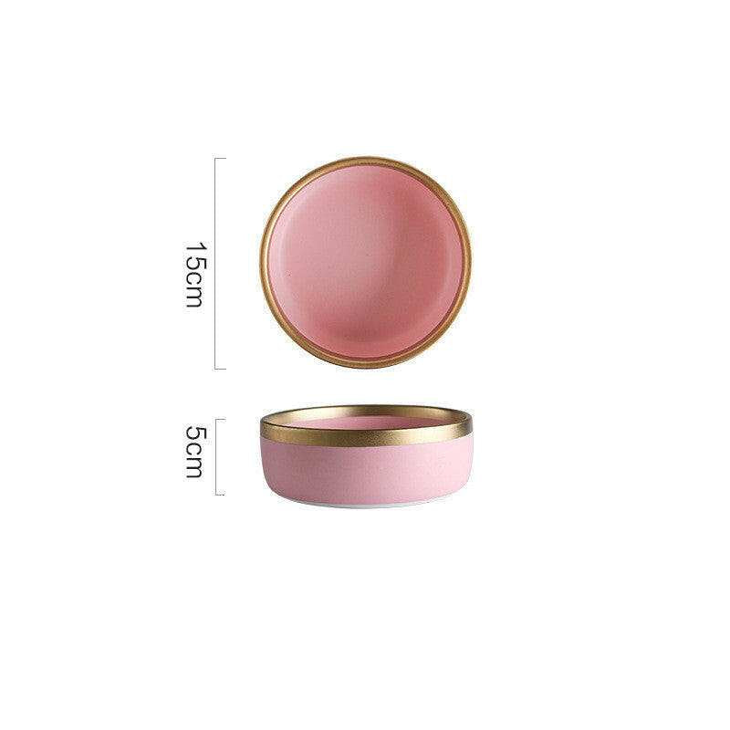 Pink Mood dining set with vibrant gold color detailing.
