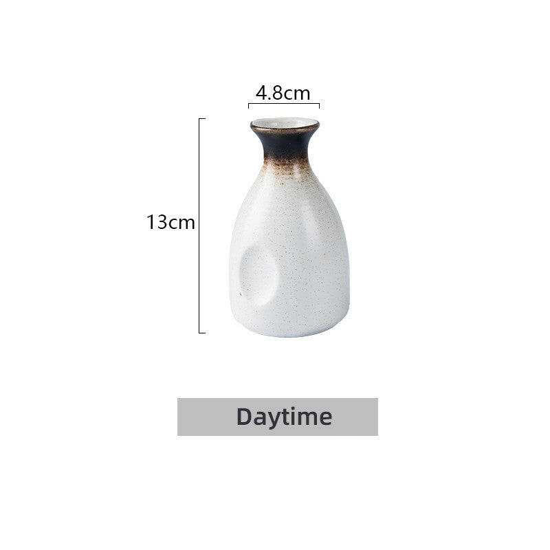 Japanese sake glass ceramic, 13cm tall, 300ml capacity, minimalist design.