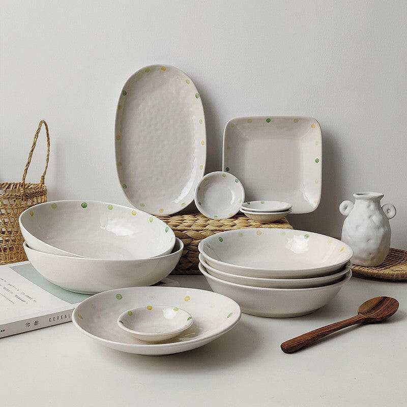 Porcelain Dinnerware Elegant set with plates and bowls for fine dining.