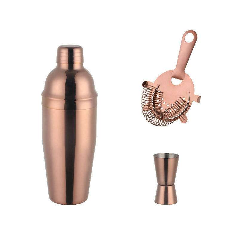 Stainless Steel Shaker with titanium plating, featuring a luxurious copper finish, included with a strainer and jigger.