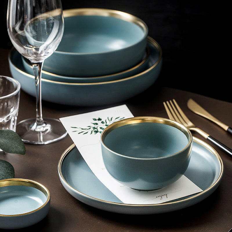 Ceramic tableware set for home with elegant design, including plates and bowls, ideal for fine dining.