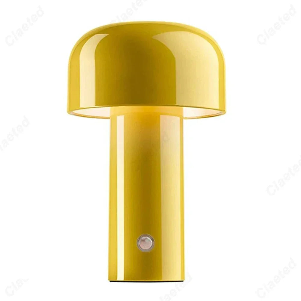 Yellow rechargeable portable table lamp with glossy finish and minimalist design.