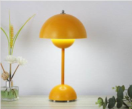 Iconic FlowerPot Lamp by Verner Panton, orange dome design, Scandinavian style.