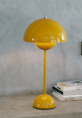 Yellow FlowerPot Lamp on table, iconic Scandinavian classic.