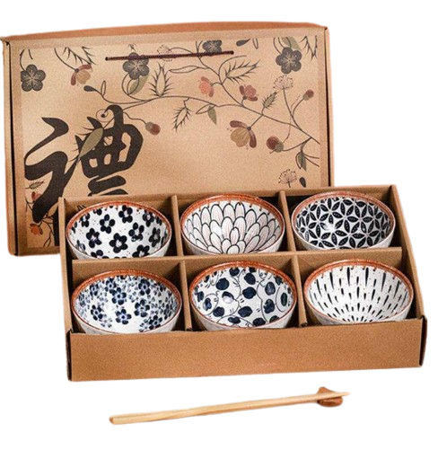 Retro box with ceramic bowls featuring nostalgic patterns in a rattan container