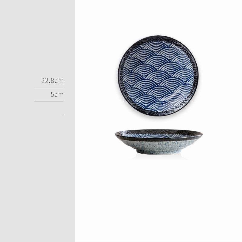 Retro Japanese ceramic plate with intricate blue pattern and elegant design.