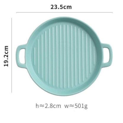 Aqua ceramic bakeware plate with handles, 23.5cm diameter, showcasing ridged surface for baking.