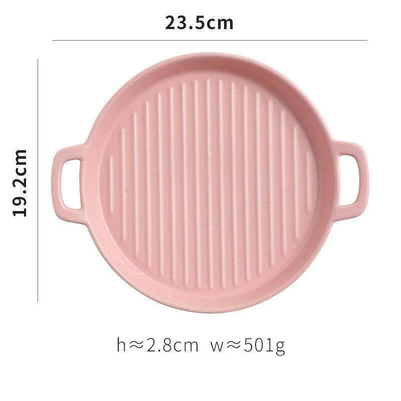 Pink bakeware with handles, 23.5cm diameter, oven and microwave safe, ideal for baking.