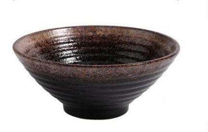 Japanese ceramic ramen bowl with glossy glaze and earthy tones.