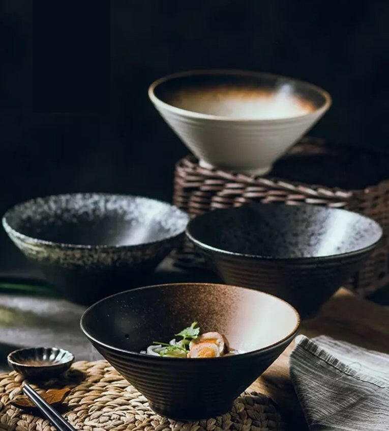 Japanese ceramic ramen bowls with smooth glaze in various colors, showcasing craftsmanship and functionality.