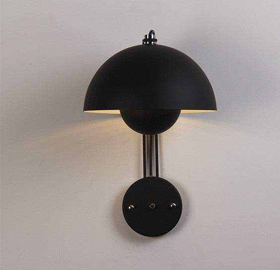 Flowerpot Lamp wall with dome-shaped shade and sleek, glossy finish.