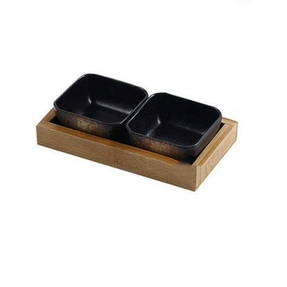 Ceramic bowls with bamboo tray set for serving and display.