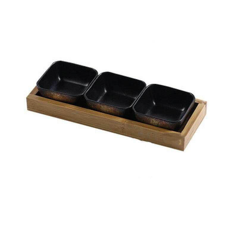 Ceramic bowls with bamboo tray set for stylish serving and presentation.