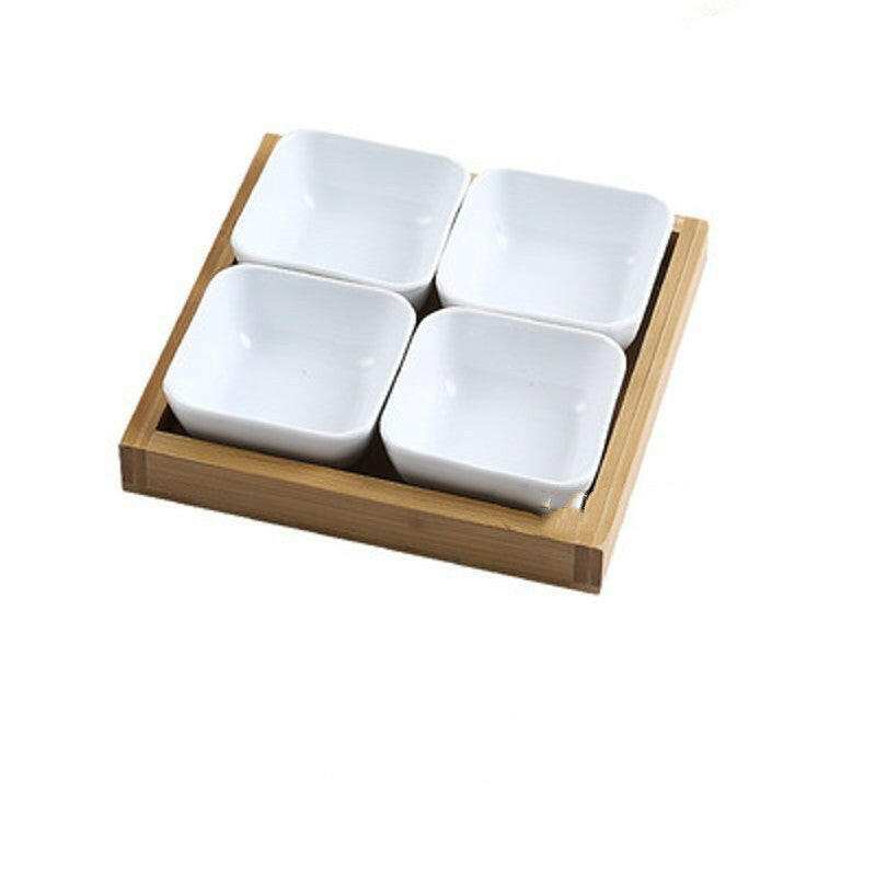 Ceramic bowls with bamboo tray for serving food and appetizers.