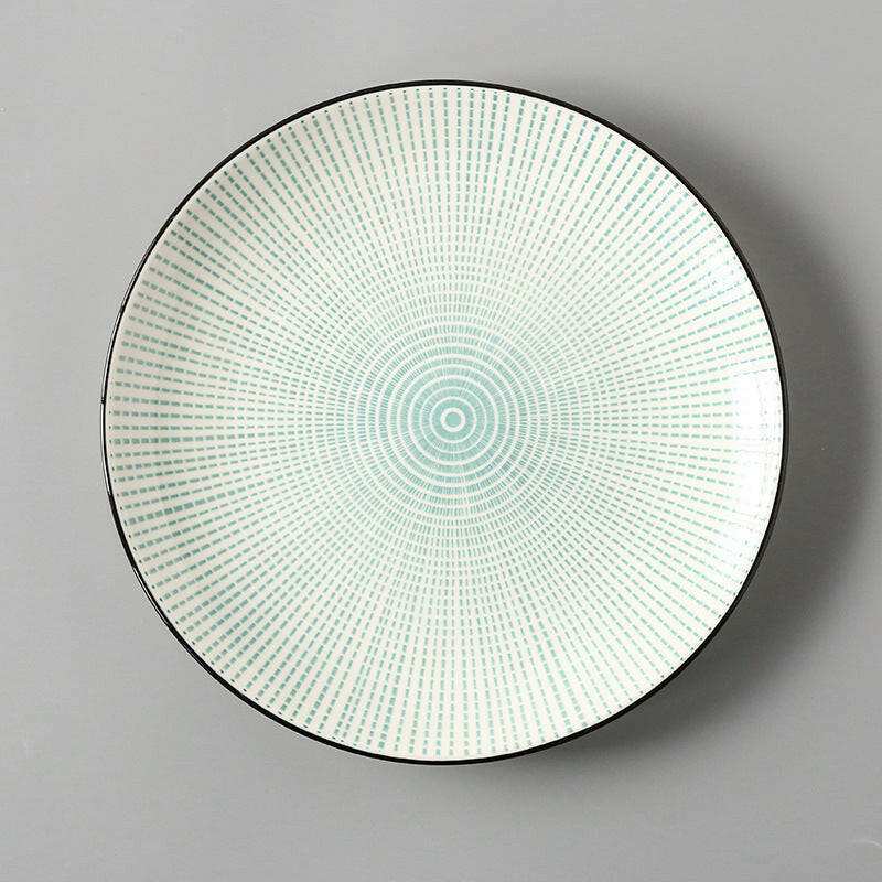 Dishes for Meals Creative, ceramic plate with intricate geometric pattern.