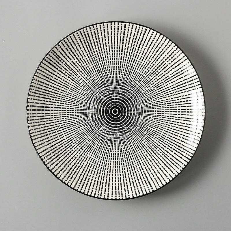 Dishes for Meals Creative, fine plate with black and white geometric pattern.