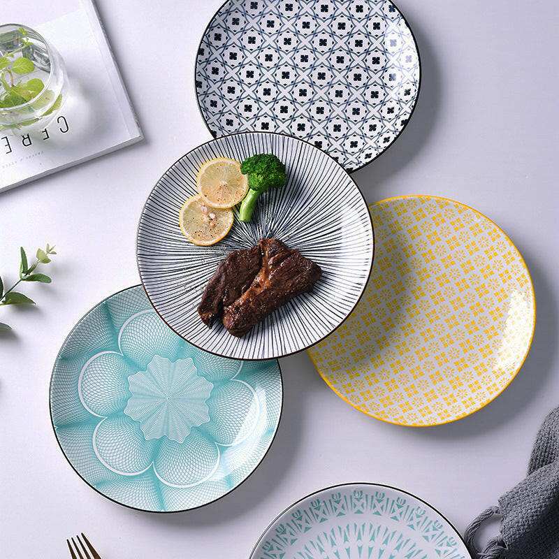 Dishes for Meals, fine plates with geometric patterns showcasing creative home cooking presentation.