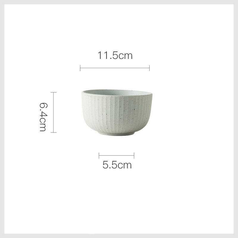 Stylized ceramic bowl with minimalist design and textured finish, dimensions 11.5cm x 6.4cm x 5.5cm.