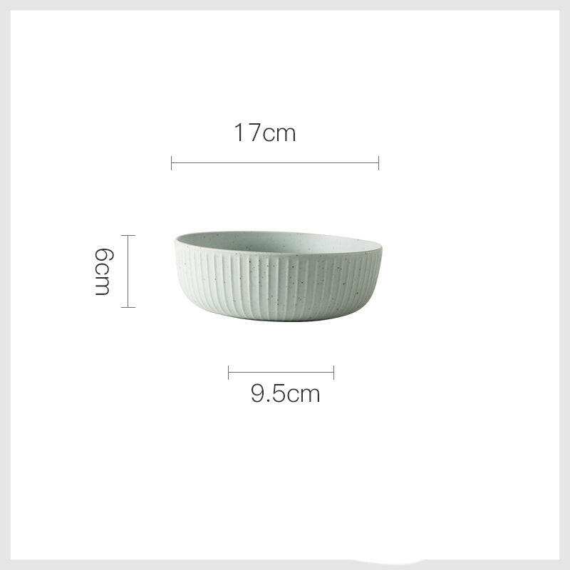 Stylized ceramic bowl, dimensions 17cm x 6cm x 9.5cm.