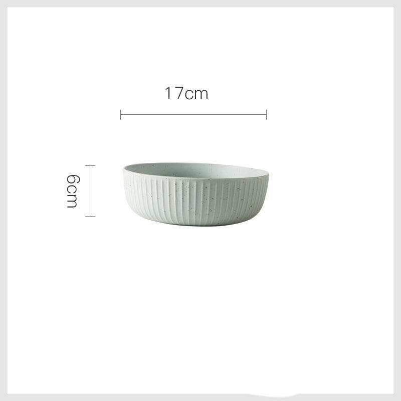 Stylized ceramic bowl, dimensions 17cm x 6cm x 9.5cm.