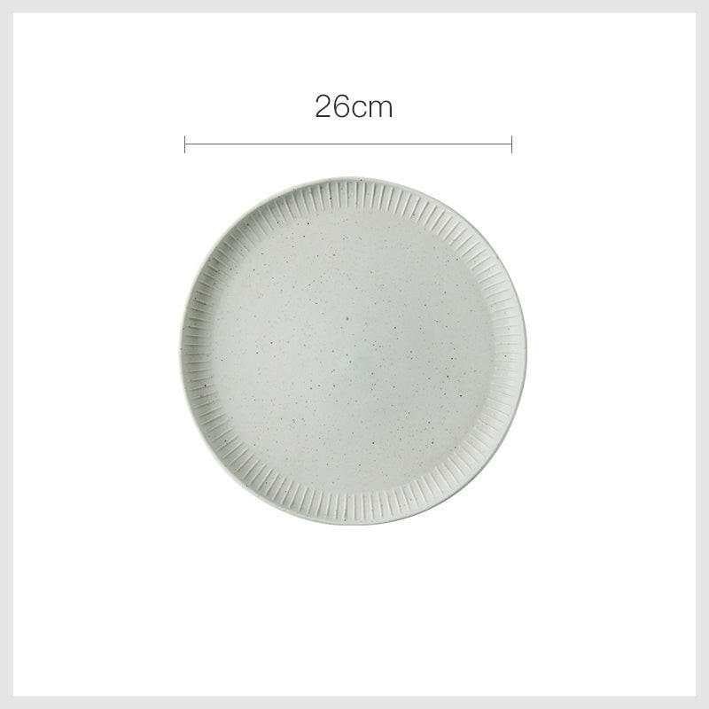 Stylized ceramic, 26cm round ceramic plate, in neutral color.