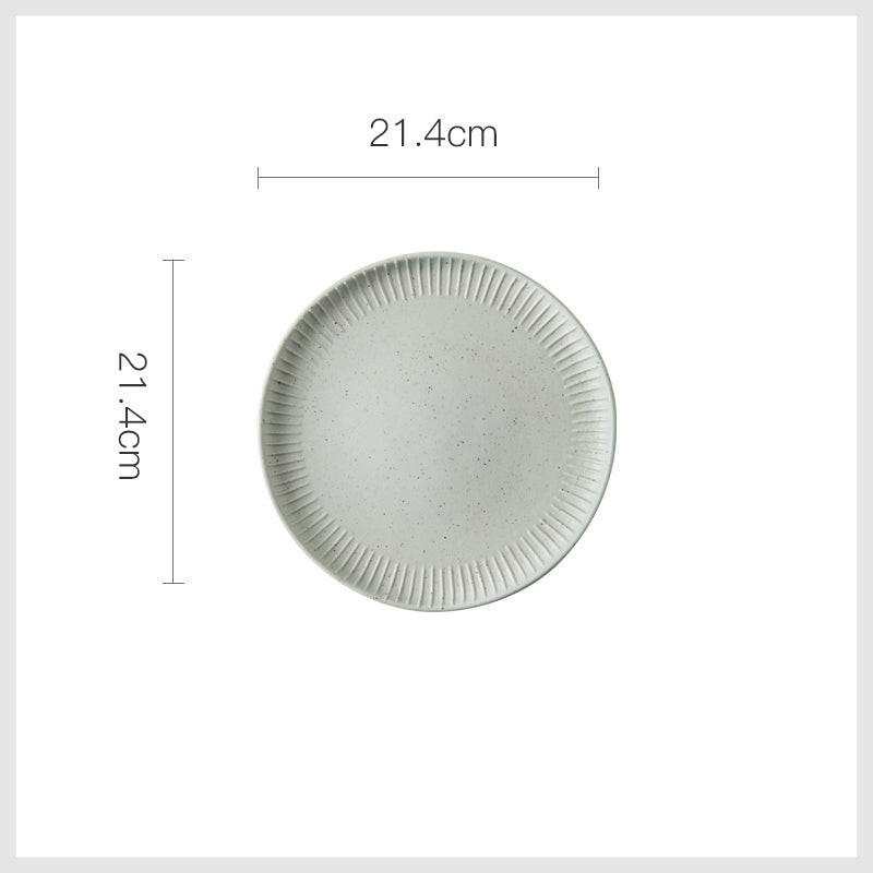 Stylized ceramic plate with a 21.4cm diameter, featuring a subtle textured design, perfect for modern dining.