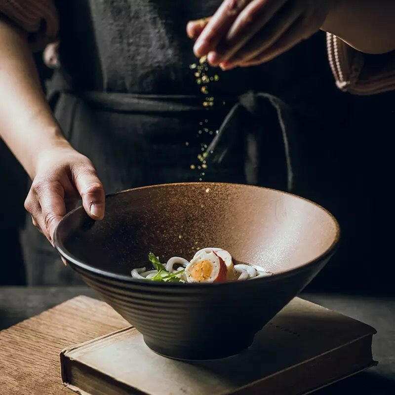 Japanese ceramic ramen bowl with intricate design, showcasing traditional craftsmanship.