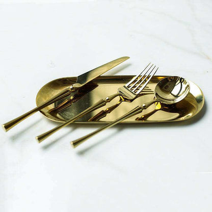 Exquisite stainless steel cutlery set with gold finish.