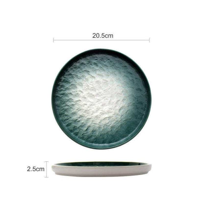 Emerald gradient ceramic plate with glossy glaze and elegant design.