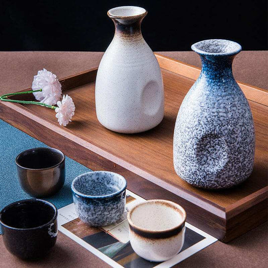 Japanese sake glass ceramic set with elegant design, showcasing traditional craftsmanship.