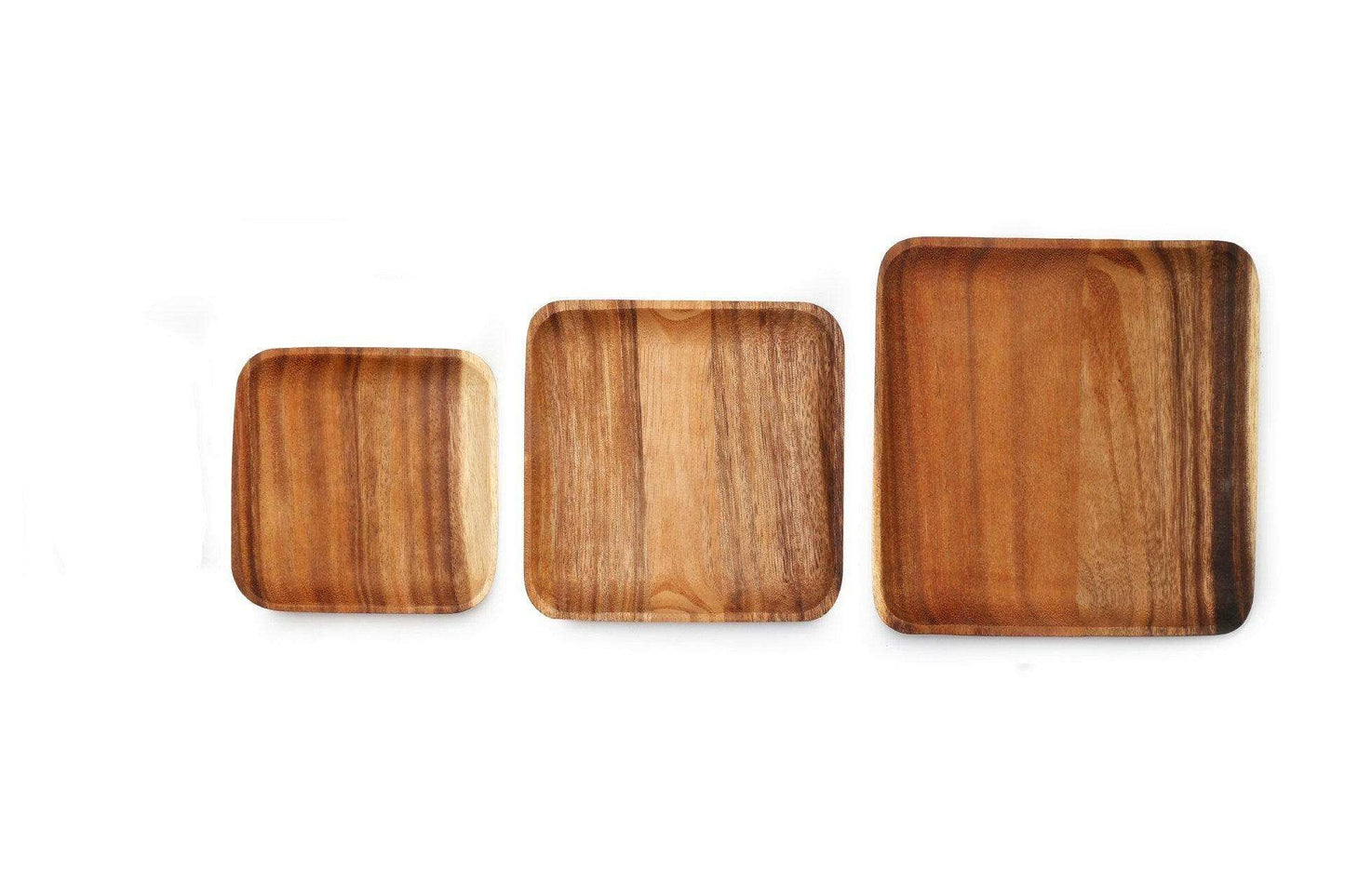 Set of rectangular acacia wood trays showcasing natural grains and textures.