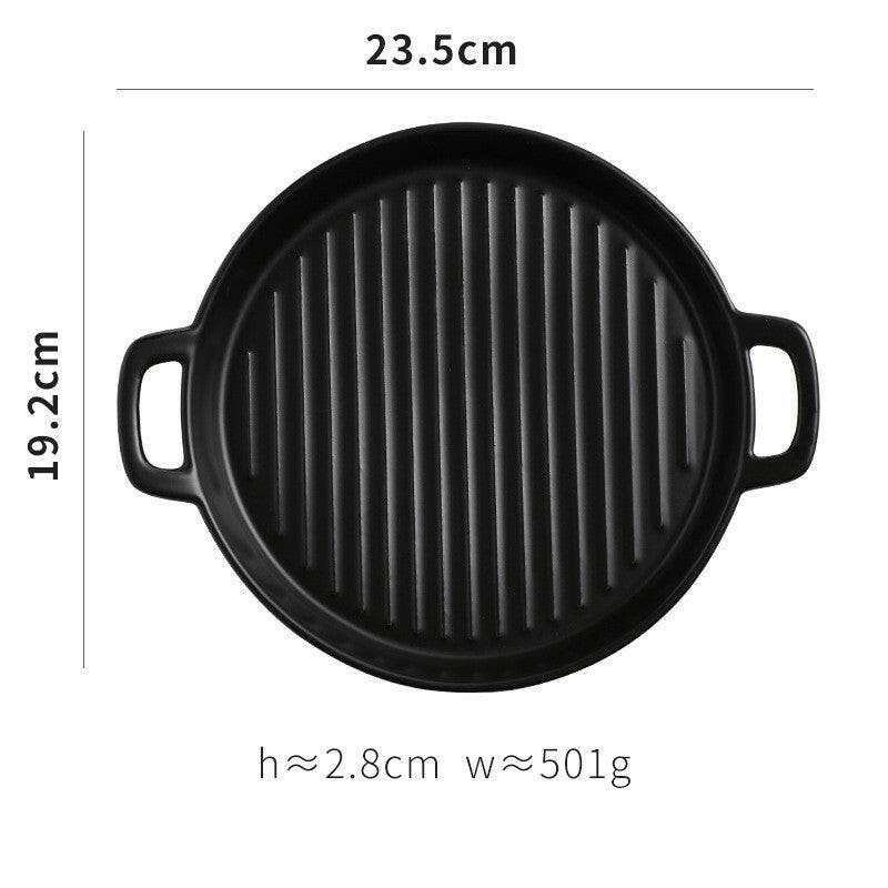 23,5cm black ceramic bakeware, with handles. Suitable for oven, microwave, and dishwasher.