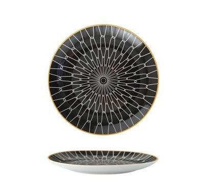 Geometric series ceramic plate with intricate black and white pattern.