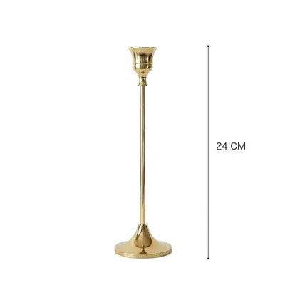 Vintage golden candle holder with sleek design and shiny finish, standing elegantly at 24 cm tall.