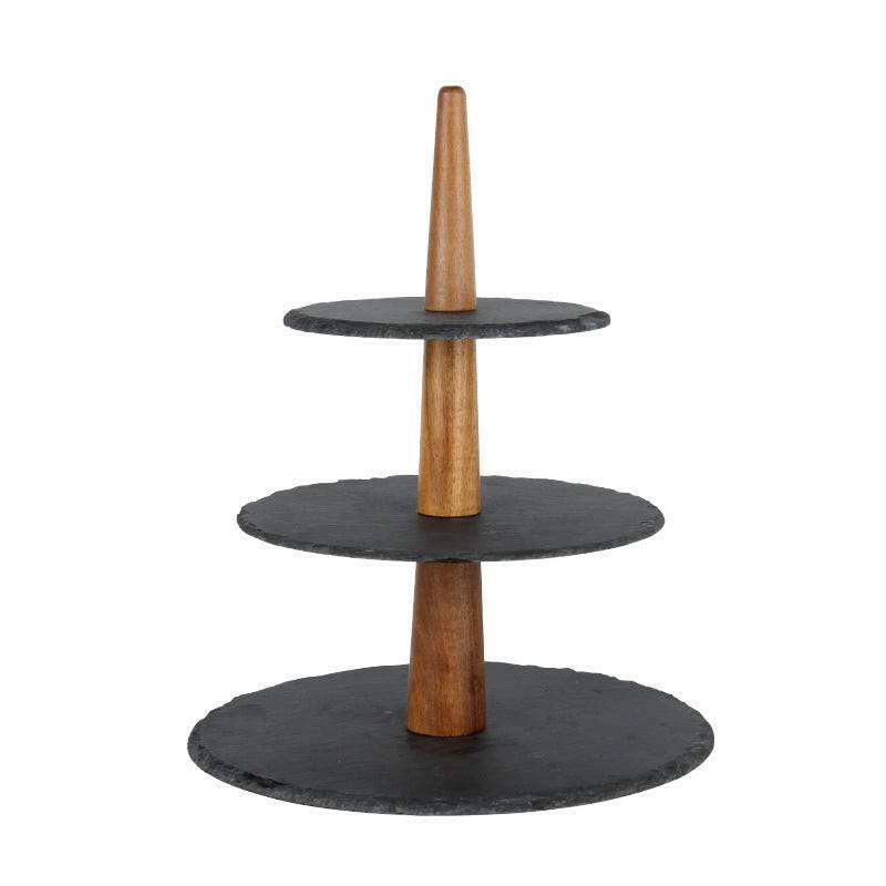 Multilayer serving tray with wooden and black stone design, featuring three tiers for elegant food presentation.