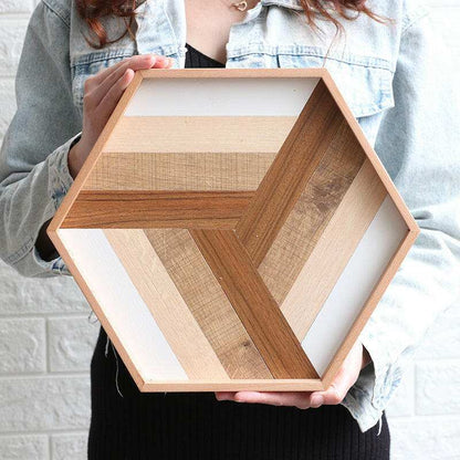 Hexagonal color wood tray with geometric design.