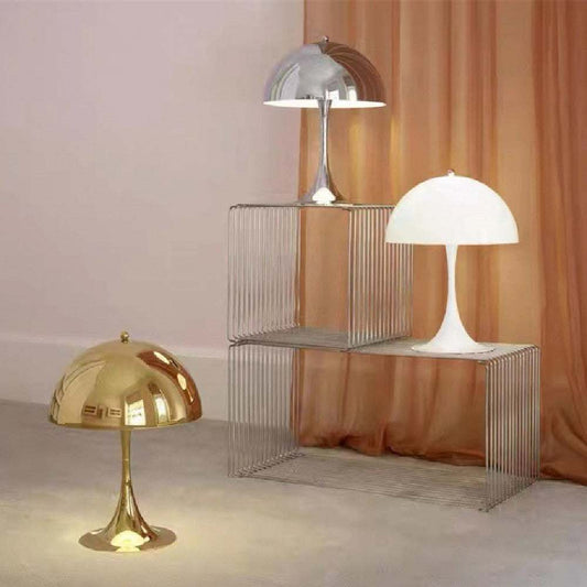 Modern Light - Iconic Danish Lamp in gold and silver, showcasing modern design and ambient lighting.