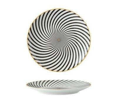 Geometric series ceramic dish with black and white spiral pattern.