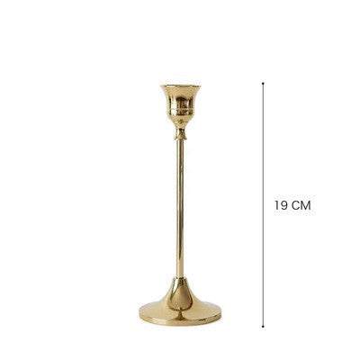 Vintage golden candle holder with elegant design, 19 cm tall.