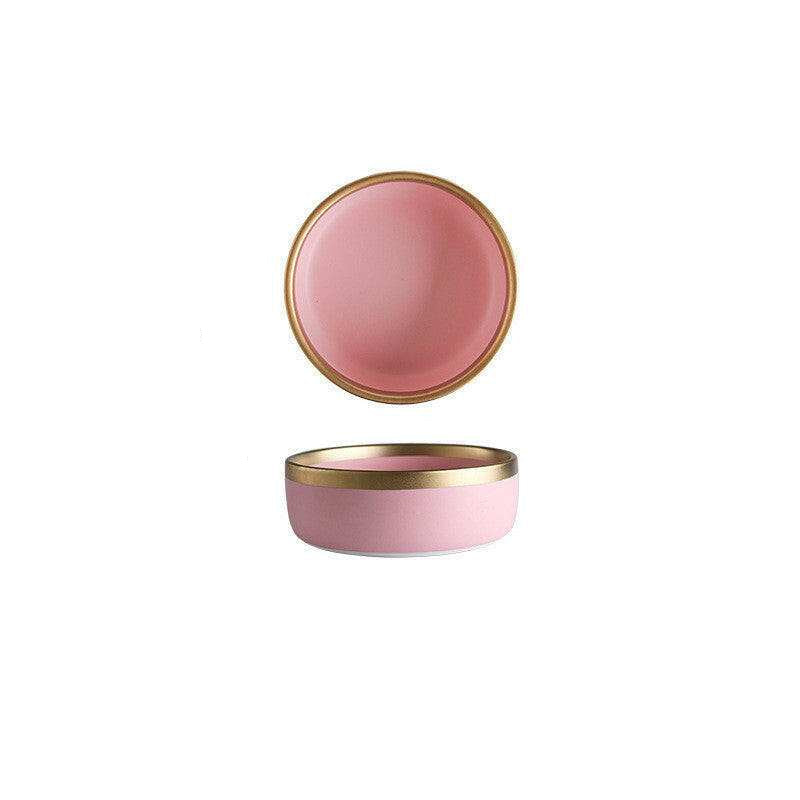 Pink Mood dining set with vibrant gold color detailing.