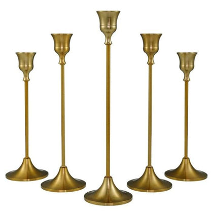 Vintage golden candle holder set with elegant tall design, ideal for sophisticated home decor.