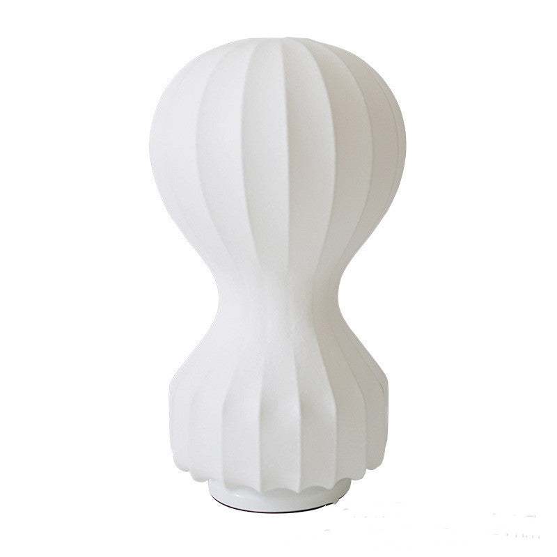 Paper Lamp gourd shape with elegant vertical grooves and dark base.