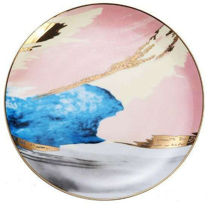 Colorful porcelain hand-painted watercolor ceramic dish with abstract blue, pink, and gold design.