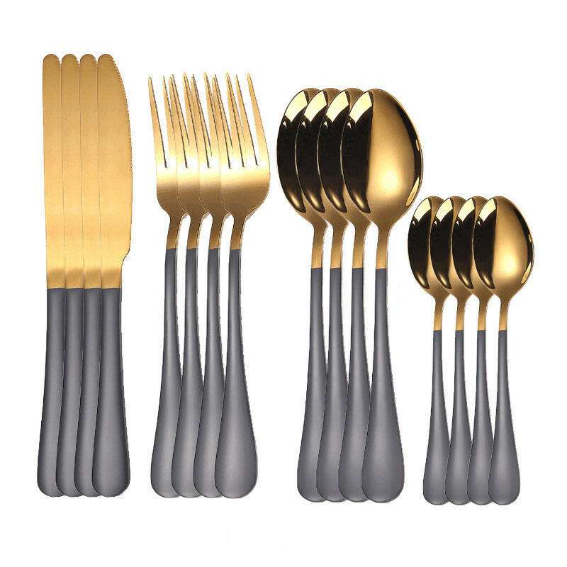 Stainless steel everyday cutlery set with gold and gray design, including knives, forks, and spoons.